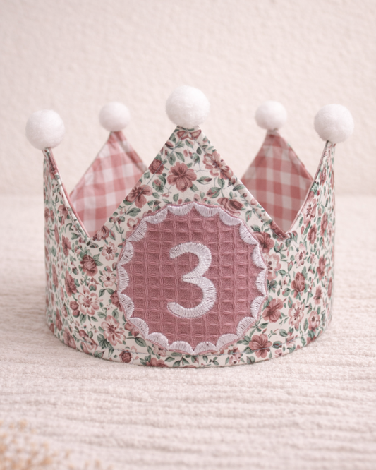 Corona de cumpleaños floral rosa