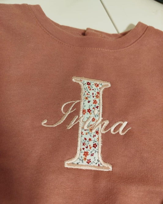 Sudadera bordada con aplique